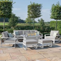 an outdoor patio furniture set with cushions