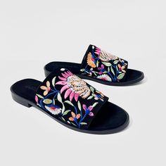 Experience luxury and style with our Rose black embroidered suede leather mule sandal. Made from high-quality suede leather, these mules feature intricate multicolor flower embroidery for a unique and elegant look. Slip into these mules for a comfortable and chic addition to your wardrobe. Features: Flower embroidery for floral look Cushioned footbed with suede leather covering Day to day wear Composition: Upper - 100% Leather Lining - 100% Leather Sock - 100% Leather Outsole - 100% Rubber Embellished Open Toe Mules For Summer, Embellished Open Toe Mules For Spring, Spring Embellished Open Toe Mules, Leather Socks, Rose Black, Mule Sandals, Leather Mules, Flower Embroidery, Embroidery Flowers