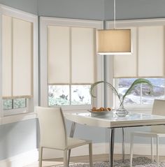 a white table and chairs in a room