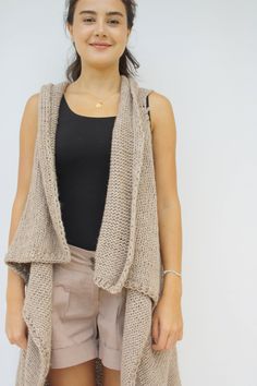 I knitted with love this Light Brown long vest. This beautiful Cappuccino Oversized Knit Vest is perfect for the changing weather, and will be fun to wear all season long. This Long Knit Top is cozy and stylish. It s very soft and warm. This Knitted Vest is easy to change around for many different looks and styles. One size fits all If you are interested in a particular color,let me know. Perfect for your self or as a gift for that special someone and Mother's day gift. This hand knitted Vest wi Oversized Knit Vest, Long Vest, Knitted Vest, Sweater Vest Women, Long Vests, Oversize Knit, Long Knit, Sleeveless Sweater, Knit Vest