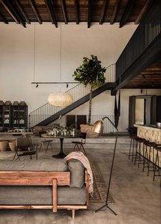 an instagram photo of a living room with couches and tables