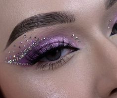 Rhinestone Concert Makeup, Purple Graphic Liner Looks, Lavender Eye Makeup Looks, Lavender Rave Makeup, Sequence Eye Makeup, Purple Quinceanera Makeup Looks, Rhinestone Makeup Euphoria, Royal Purple Makeup, Purple Makeup For Wedding