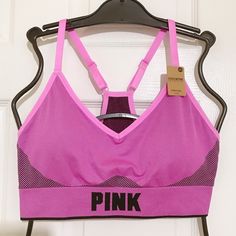 Victoria’s Secret Pink Sports Bra 44 Pink Stretch Athleisure Bra, Athleisure Pink Bra, Athleisure Stretch Pink Bra, Sporty Pink Gym Bra, Sporty Loungewear Bra, Pink Sports Bra With Stretch, Pink Athleisure Bra With Light Support, Pink Fitted Sporty Bra, Pink Seamless Gym Bra