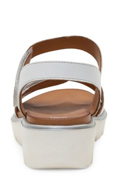 A lightweight platform wedge elevates this sporty sandal featuring a cushy, arch-supporting footbed and wide, adjustable leather straps for all-day comfort. Flat sole Removable, cushioned insole with arch support Leather upper and lining/synthetic sole Imported White Leather Wedge Sandals With Arch Support, Comfortable White Leather Wedge Sandals, Casual Leather Platform Sport Sandals, Casual Leather Sport Sandals With Platform, Comfortable Leather Platform Sport Sandals, Sporty Leather Platform Sandals, Synthetic Wedge Heel Sport Sandals With Cushioned Footbed, Comfortable Leather Slingback Sport Sandals, Leather Platform Sport Sandals