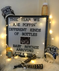 a sign that says this year we are poppin's different kinds of bottles