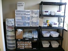 the shelves are filled with plastic containers and other items to store for storage or storing