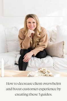 a woman sitting on top of a white couch