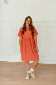 Feel comfortable without sacrificing style in this modest length midi dress that is perfect for the late summer season! The unique textured knit fabric makes the 'Reese' standout, while still maintaining the classic t-shirt dress style. Layer with a sweater for a cozy look, or add a denim jacket for an elevated chic! 93% Polyester, 7% Spandex Unlined Hand Wash Cold Separate Hang or Lay Flat to Dry Do Not Bleach Low Iron If Needed Maternity/Bump Friendly! FINAL SALE: NOT ELIGIBLE FOR RETURN OR EX Casual Crew Neck Midi Dress For Fall, Summer Ribbed Midi Dress With Short Sleeves, Spring Ribbed Midi Dress For Daywear, Casual Crew Neck Midi Dress, Spring Ribbed Short Sleeve Dresses, Spring Loungewear Solid Color Dresses, Casual Crew Neck Midi Dress For Daywear, Casual Ribbed Dress For Daywear, Casual Ribbed Midi Dress For Day Out