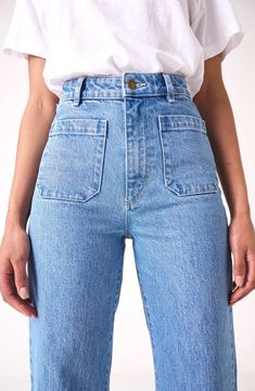 Fall for the silhouette of these high-waist jeans made from stretch-kissed denim in a light-blue wash with retro patch pockets and wide ankle-grazing hems. 28" inseam; 23" leg opening; 12 1/2" front rise; 14 1/2" back rise (size 29) Zip fly with button closure Five-pocket style 99% cotton, 1% elastane Machine wash, line dry Imported Lily Blue, Sailor Jean, Sailor Fashion, Trend Fashion, Denim Design, Looks Style, Mode Inspiration, Mode Outfits, Outfits Casuales