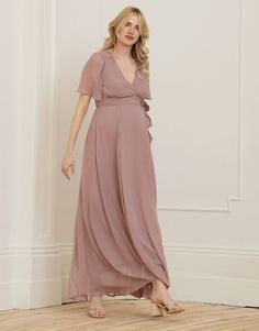 Soft, flattering & utterly feminine, Seraphine's Mauve Maxi Maternity & Nursing Wrap Dress is a stunning style for special occasions - we love it for weddings. Elegant Floor-length Maternity Dress For Wedding, Feminine Flowy Dress For Wedding Guest, Flowy V-neck Maternity Dress For Wedding, Fitted V-neck Maternity Bridesmaid Dress, Elegant Flowy Maternity Maxi Dress, Elegant Spring Maternity Dress In Chiffon, Elegant Flowy Maxi Maternity Dress, Elegant Chiffon Maternity Dress For Spring, Elegant Pink Maxi Maternity Dress