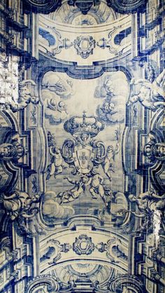 the ceiling is decorated with blue and white designs