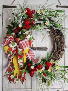 This summer Strawbery wreath is made on a 18" grapevine and measure around 24" tall and wide -20" leaf tip to leaf tip. It is composed of a faux mix of strawberries, strawberries flowers and white Lavanda. Give your friends and neighbors a good first impression starting with your front door with this eye-catching, contrasting wreath. Add a pop of summer to your front door for instant curb appeal and give your home a great first impression. Greet your guests with a warm welcome! Wreaths also make great gifts for housewarming, birthdays, weddings, and more! All the materials in this wreath are a high quality faux, so it looks real, but will last for many years to come. Coloring may slightly vary due to blue light filters on phones & screens. Please be aware of this prior to purchase. WEAR & Strawberry Kitchen Decor, Strawberry Wreath, Welcome Wreaths, Gifts For Housewarming, Strawberry Kitchen, Strawberry Flower, Light Filters, Rustic Wreath, Summer Home Decor