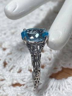 Victorian Topaz Ring, Victorian Style Topaz Ring, Handmade Elegant Blue Topaz Ring, Handmade Blue Topaz Ring, Victorian Style Silver Ring With Blue Topaz, Victorian Blue Topaz Ring In Silver, Victorian Silver Blue Topaz Ring, Topaz Ring With Intricate Design For Gift, Gift Blue Topaz Ring With Intricate Design