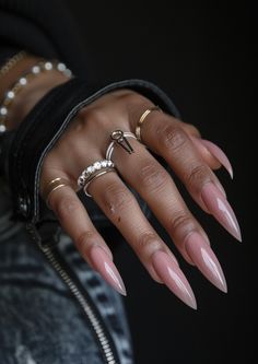 Elegant Nude Stiletto Nails with Subtle Pink Gradient - Get inspired for your next salon visit with these meticulously sculpted stiletto nails featuring a gentle pink gradient. These nails are perfect for anyone looking to add a touch of sophistication to their look. Visit nailhow.com for more stiletto nail designs that combine elegance with a daring edge. Colourless Nails, Summer Acrylic Nails Almond Ombre, Nails Acrylic Pointy Stilettos, Nail Stelitto Ideas, Neon Tip Nails Almond, Curved Stilleto Acrylic Nails, Long Round Nail Designs, Nail Inspo Almond Minimalist, Short Point Nails