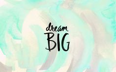 the words dream big written in black ink on a blue and white watercolor background