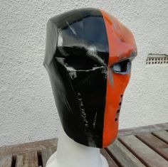 Description  A face mask with elastic strap - one size fits all. This is based on the DC Villain Deathstroke and  makes the perfect addition to a fancy dress costume, cosplay event or for display purposes.  Materials Used  * EVA Foam  * Contact Cement  * Hot Glue  * Acrylic Paints  * Flexi Paint  * Spray Paints  * Varnish  * Elastic Strapping to secure to head If you are allergic to any materials we would urge you to contact us before purchase to ensure the item would be safe for you to use.  Cu Spray Paints, Dc Villains, Deathstroke, Costume Mask, Fancy Dress Costumes, Hot Glue, Costume Accessories, Face Mask, Mask