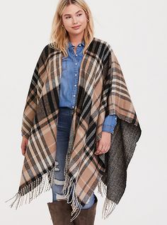 Soft and oversize, this ruana is comparable to a blanket with an oversized plaid pattern on one side and a herringbone pattern on the other side to guarantee it will match your fall outfits. Open front. Wrap sleeves lets you style it a variety of ways. Fringe trim. CONTENT + CARE: Acrylic. Wash cold; dry flat. Imported plus size kimono. SIZE + FIT: Model is 5’10”. This item is One Size and measures 34. 5” from shoulder. The best plus size women's caramel plaid fringe ruana capes ponchos & ru Plus Size Kimono, Plaid Poncho, Oversized Turtleneck, Diy Clothes Life Hacks, Black Scarf, Fashion Design Sketches, Fashion Plus Size, Clothing Hacks, Herringbone Pattern