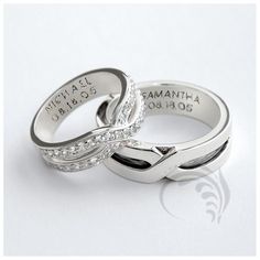 two wedding rings with names on them