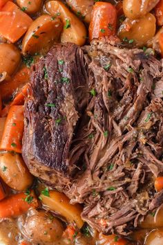 a pot roast with carrots and potatoes