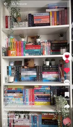 a white book shelf filled with lots of books