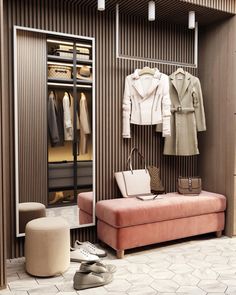 an open closet with clothes and shoes on the floor next to a pink bench in front of it