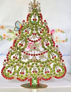 a christmas tree made out of beads and jewels