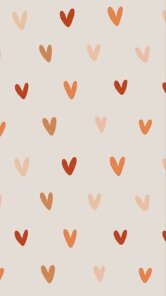 an orange and red heart pattern on a beige background