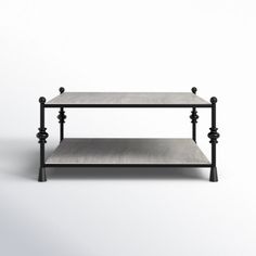 a table with two shelves on one side and an end shelf on the other, in front of a white background