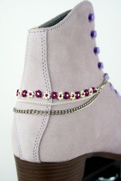 "Perfect for those who have sensitive skin or a metal allergy and cant do skin to skin contact with regular jewelry. Accessorizing your shoes/boots allows you have the fun of an anklet without the irritation! Alternating wine and pearl white beaded daisy chain boot cuff with white and stainless drop chains. Accented with clear seed beads. Stainless chain. Can be mixed, matched and styled with other accessories. Add them onto skates, shoes, boots, sneakers, etc. If you would like a matching pair, Beaded Daisy Chain, Shoe Accessories Diy, Roller Skate Accessories, Concert Nails, Skate Accessories, Skates Shoes, Beaded Daisy, Boot Chains, Boot Cuff