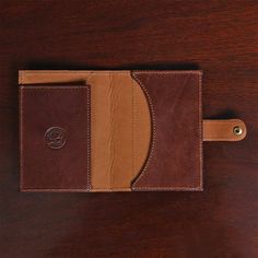 Carry your essentials in this upscale, lightweight, full-grain American Buffalo Wallet. Brown Wallets With Card Slots For Daily Use, Classic Bifold Wallets For Travel, Classic Travel Wallets With Card Slots, Brown Wallets With Interior Card Slots For Daily Use, Brown Travel Wallet With Coin Pocket, Brown Rfid Blocking Card Holder For Business, Brown Rectangular Wallet With Interior Card Slots, Brown Bifold Wallet For Daily Use, Classic Trifold Card Holder For Travel