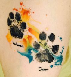 the paw prints on someone's leg are all different colors