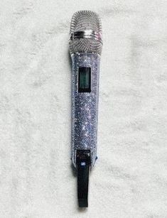 an old fashioned microphone laying on the ground