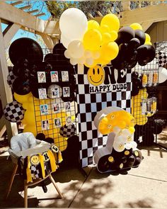 balloons and decorations are on display at a race themed birthday party