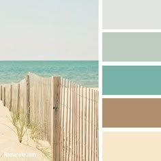 a beach scene with the ocean and sand in shades of blue, green, beige, and white