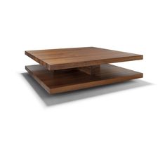 a wooden coffee table sitting on top of a white surface