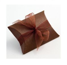 a brown box with a bow on it