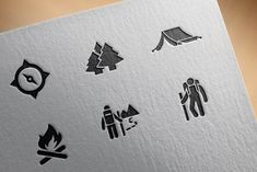 various stickers on the side of a piece of paper that shows different types of camping related items