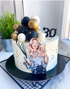 a birthday cake decorated with an image of a woman holding a wine bottle and balloons