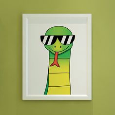 a green snake with sunglasses and a red tie on it's head is hanging on the wall