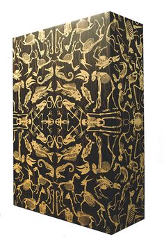 an intricately designed box with animals and birds on it