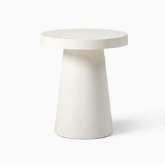 a white round table with one foot on the top and two legs on the bottom