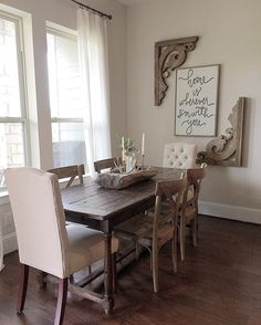 the dining room table is set with chairs