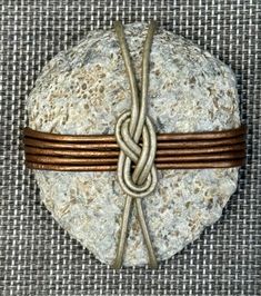 a rock with a rope wrapped around it