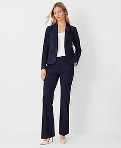 Elevate your wardrobe with the Ann Taylor High Rise Trouser Pant in Seasonless Stretch, a perfect blend of style and comfort. These trousers are designed to flatter with a high-rise waist that sits just below the natural waistline, and a tailored fit that streamlines your silhouette. The slight flare at the leg opening adds a touch of elegance, making these pants ideal for both office and evening wear.

- **Size:** Regular - 4
- **Color:** Deep Navy Sky
- **Material:** 68% Polyester, 29% Viscose Sleek Fitted Pantsuit For Fall, Chic Career Pants With Welt Pockets, Chic Career Pants For Fall, Elegant Straight Leg Career Pants, Elegant Straight Leg Pants For Career, Elegant Career Pants With Straight Leg, Spring Stretch Office Suits, Spring Office Stretch Suits, Spring Stretch Suits For Office