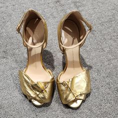 Great Condition-Giuseppe Zanotti Design Gold Leather Us 38 (8) A Few Scuffs On Shoes But Still In Good Condition Approx 5" Heels Chic Gold Sandals For Galas, Chic Open Toe Heels For Galas, Glamorous Heels For Spring Galas, Gold Heels For Spring Galas, Chic Gold Cocktail Heels, Luxury Gold Heels In Metallic Leather, Guissepe Zanotti Heels, Gold Leather T-strap Heels, Leather Open Toe Heels With Gold-tone Hardware