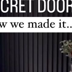 there is a sign that says secret door now we made it, and flowers are in the vase