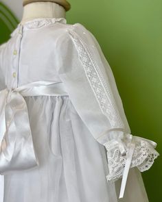 Delicate christening gown for boys and girls. Made with a lightweight swiss organdy in white, with gorgeous laces and embroidered polka dots. It comes with a matching bonnet. 2 piece set Dry Clean Made in Spain Final sale, no exchanges nor returns will be accepted Christening Gowns For Boys, Baptism Dresses, Christening Dresses, Baptism Gown, Christening Gown, Spanish Fashion, Baptism Dress, Christening Dress, Christening Gowns