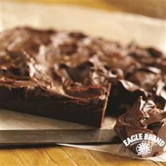 a close up of a chocolate dessert with a can of fudge in the background