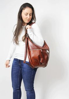 Leather hobo bag - Top zipper closure bagDIMENSIONS:Height: 13.4 in (34 cm)Max width: 16,9 in (43 cm)Bottom: 8x3.6 in (20x9 cm)Short strap: 18.5 in (47 cm)Long Strap: max 43 in (110 cm)Large hobo bag made from high quality leather.This leather handbag can be worn on your shoulder, on the forearm or in your hand.  This leather bag is a perfect everyday bag! There is a lot of space and you can put there everything in your everyday life.Includes internal pockets for mobile phone and other small ite Everyday Hobo Bucket Bag With Zipper, Everyday Hobo Bucket Bag With Zipper Closure, Daily Use Hobo Bucket Bag With Zipper Closure, Daily Use Hobo Bag With Zipper Closure, Daily Use Hobo Bag With Zipper, Everyday Hobo Bag With Zipper Closure And Backpack Shape, Leather Fringe Handbag, Fringe Handbags, Large Hobo Bag