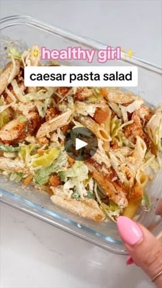 a person holding a pink manicure in their left hand, with the caption healthy girl ceasar pasta salad